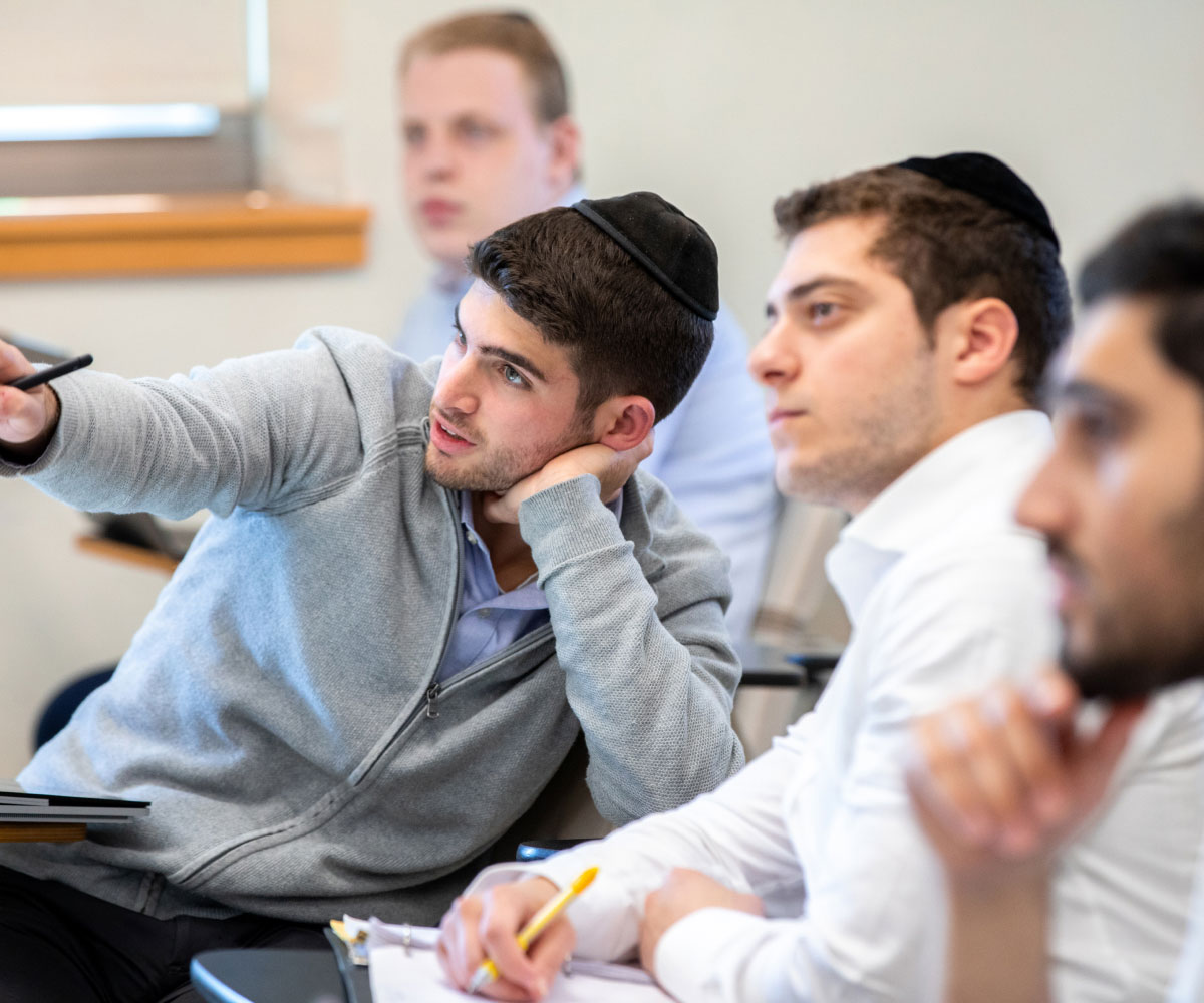 Four students sitting in class