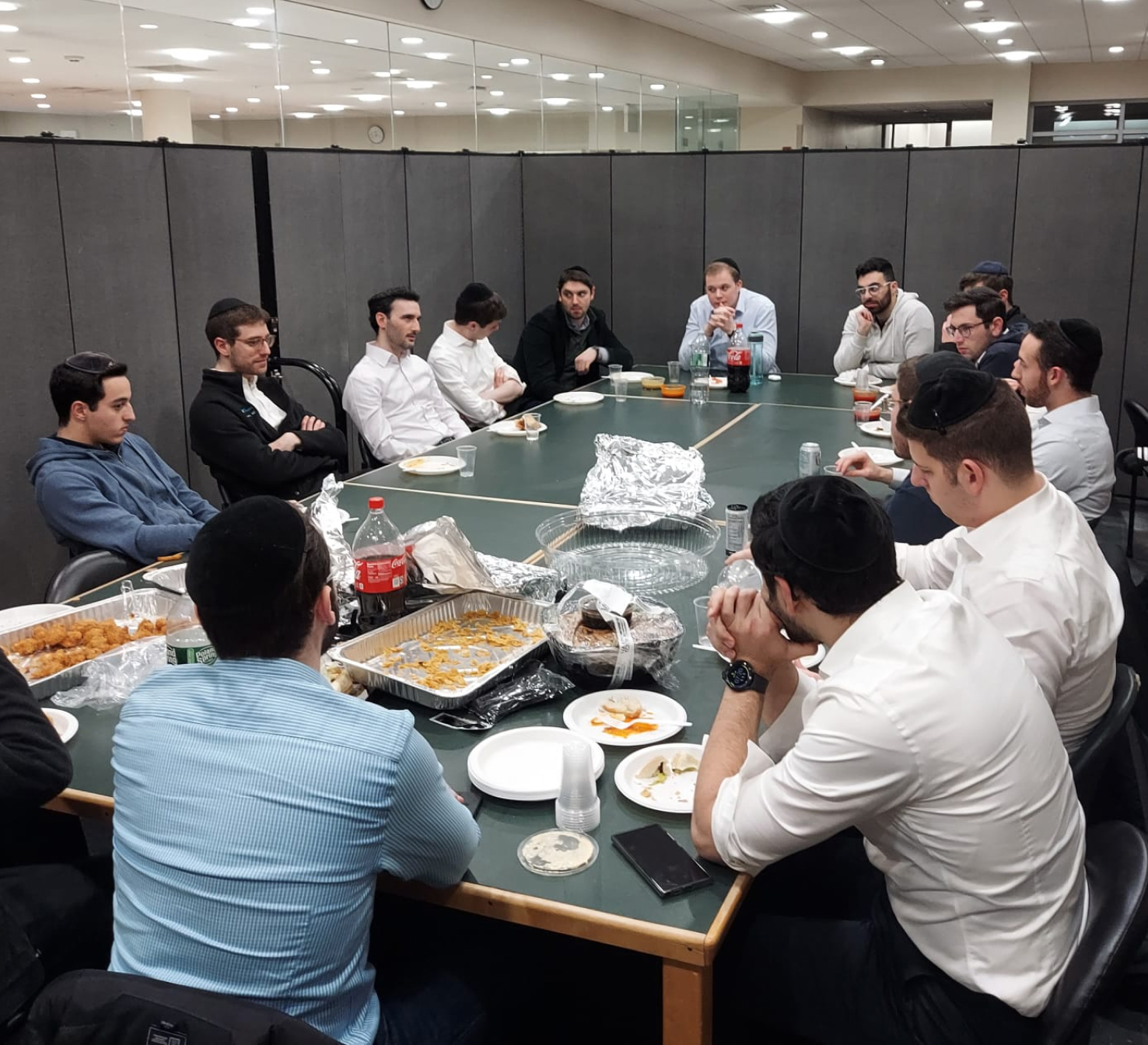 Alumni and current students meeting at a table