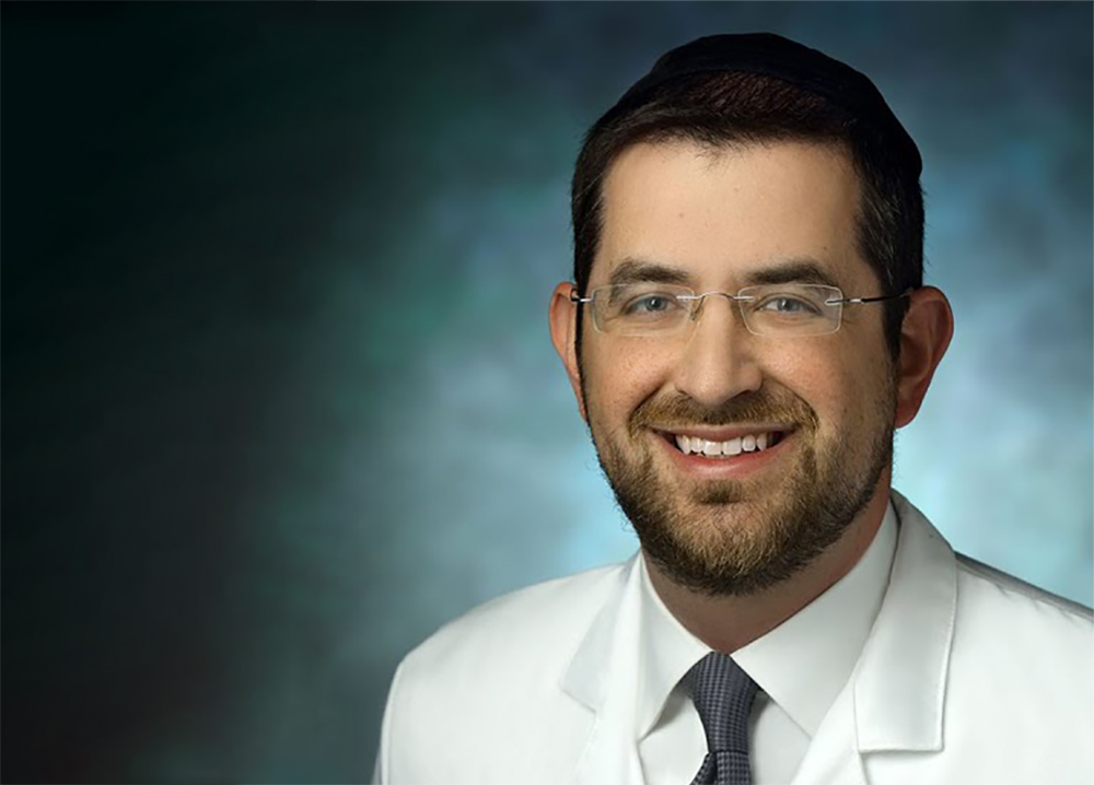 Headshot of Dr. Dani Sova in white coat